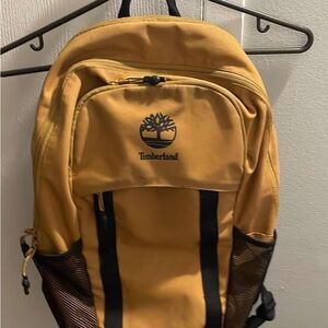 Timberland Yellow Backpack with Classic Design and Multiple Compartments